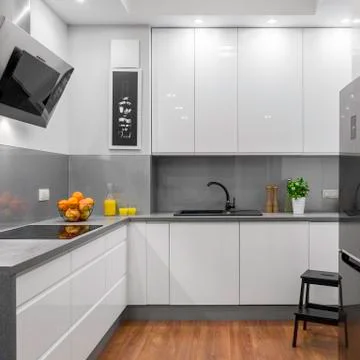 Bright kitchen in apartment Stock Photos