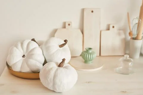Bright kitchen in the style of Provence, on the table dishes and a bouquet of fl Stock Photos