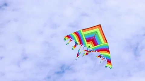 Bright kite against the cloudy sky. Toy for children and adults Stock Footage 311717542