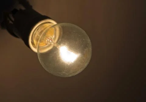 Bright lamp in the dark Stock Photos