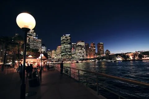 Bright lamp night sky in the city side across harbor bridge Stock Photos