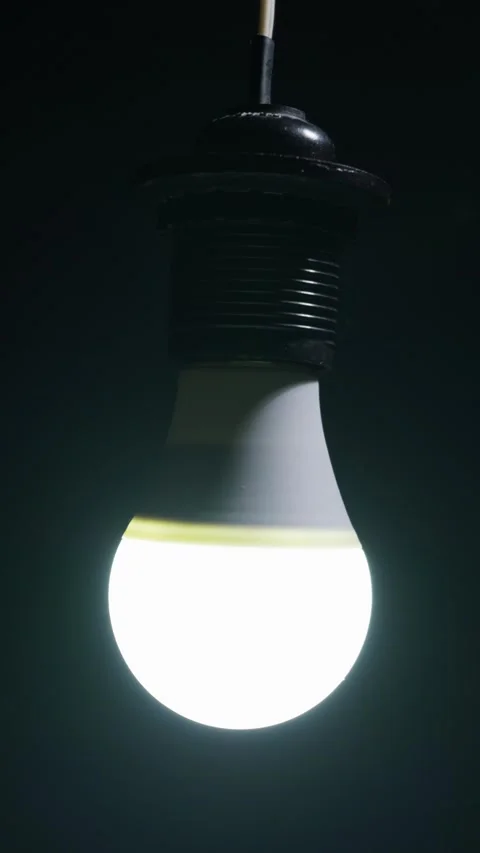 Bright Led Light Bulb Glowing in Dark Background for Idea Innovation Stock Footage 333829741