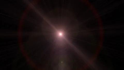Bright Lens Flare Effect in a Dark Background with Light Rays and Glow Video stock 338302074
