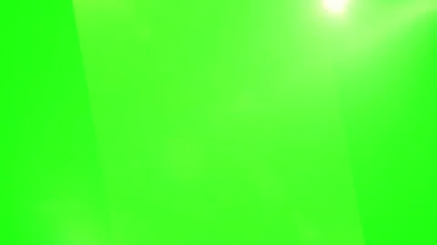 Bright lens flare effect isolated on a vibrant green screen background Video stock 346199805