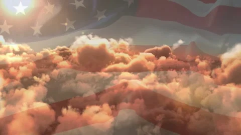 Bright light appearing top-left, US flag overlay rising as golden clouds Stock Footage 334768308