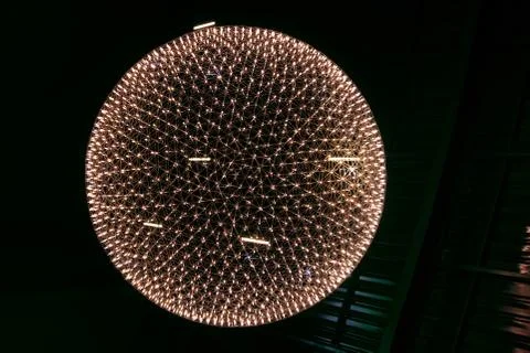 Bright light ball. Light ball on dark background. Stock Photos