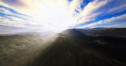 Bright light breaks through clouds over rugged mountain landscape at dawn Stock Illustration