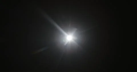 Bright Light Burst Against Dark Background イラスト素材