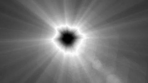 Bright light bursts outward with radiant beams Video stock 340529199