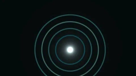 Bright light with expanding circular waves in dark space Stock Footage 338403755