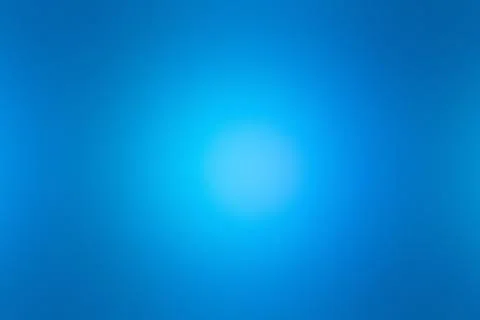 A bright light glows in the center of a deep blue background. イラスト素材