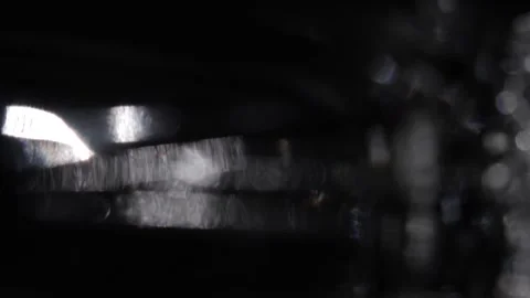 Bright light leaks in the form of vertical lines in the blackness Vidéo 318593723