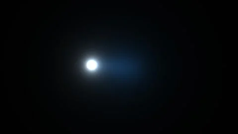 Bright light moving slowly through a dark space Stock Footage 338328027