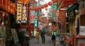 Bright Light Neon Vibrant Sign People Crowd Walking Shopping Street Yokohama Day HD Footage