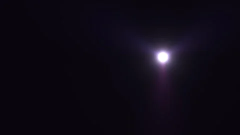 Bright light shines in dark night sky creating dramatic Stock Footage 338296336