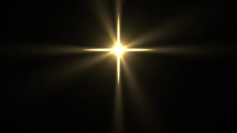 Bright light shining in dark space creates a starburst Stock Footage 338103712