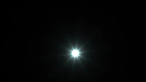 Bright light shining in dark space with starburst effect Stock Footage 338415684