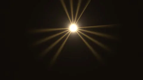 Bright light shining through dark background with radial Video stock 338195381