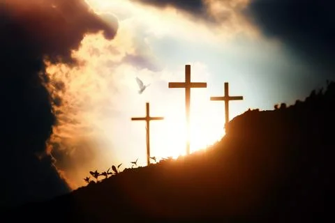 Bright light shining through the sky and clouds, dove and cross 스톡 사진
