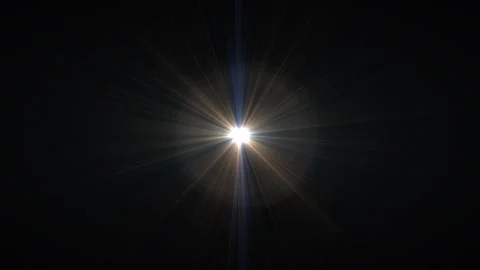 Bright Light Source in Dark Space with Radiating Beams and Flare Effects Видео 337956638