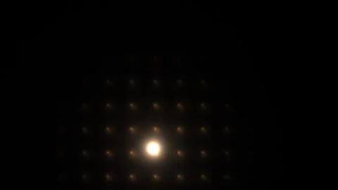 Bright light source in a dark space with glowing dots Stock Footage 338403982