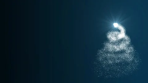 Bright light source draws a Christmas tree made of blue particles on a blue Stock Footage 256966919