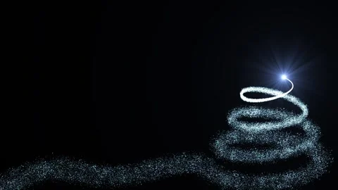 A bright light source draws a Christmas tree made of blue particles on a dark Stock Footage 257671575