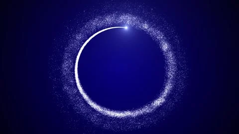 A bright light source flies in a circle, leaving a trail of particles on a dark Stock Footage 256322401