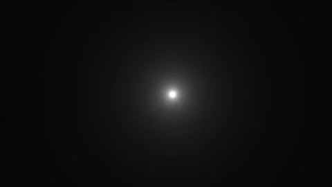 Bright light source radiating outward in dark void, gentle pulsating glow, .. Vidéo 335023161
