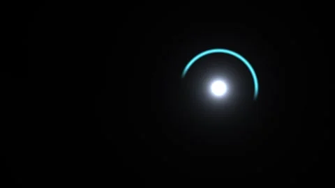 Bright light source surrounded by colorful ring effects in Stock Footage 338202351
