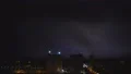 The bright lightning against the night city background 4k or 4k+ Resolution