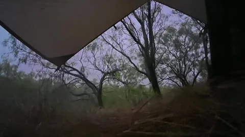 Bright Lightning Flashes During Thunderstorm Under Tarp Shelter Stock Footage 337236649