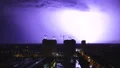 The bright lightning on the night city background 4k or 4k+ Resolution