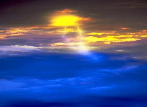 Bright lightning strike piercing through dramatic golden and blue storm cloud Stock Photos