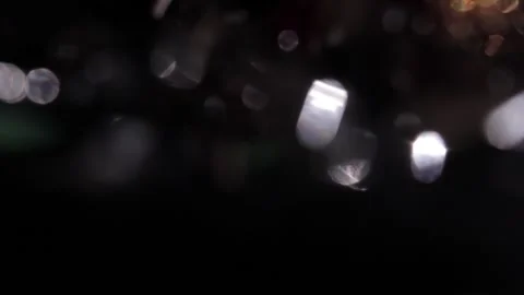 Bright lights with bright changing abstract bokeh in the dark Stock Footage 318580683