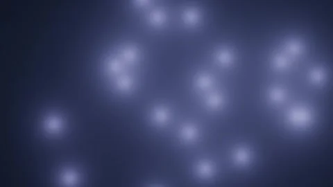 Bright lights create an abstract pattern on a dark Stock Footage 340212119