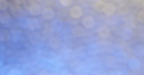Bright lights create soft patterns on a surface during a celebration at night in Stock Photos