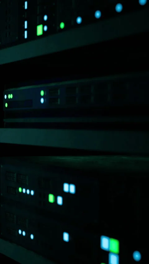 Bright lights flicker from server racks in a dark tech environment Stock Footage 334215269
