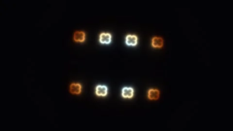 Bright lights form a pattern against a dark background Stock Footage 338316644