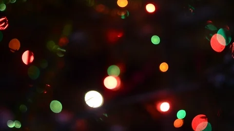 The bright lights of garlands of multi-coloured light flashing in the darknes. Stock Footage 120146151