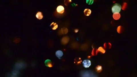 Bright lights garlands multicolored light flashing in the dark on a festive. Stock Footage 120146051