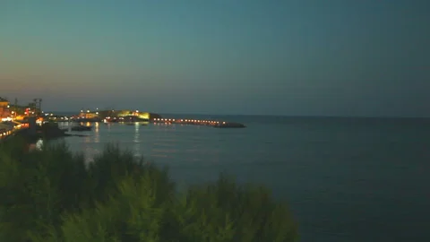 Bright lights of hotels and summer cafes along the beautiful seashore. Beautiful Stock Footage 94381353