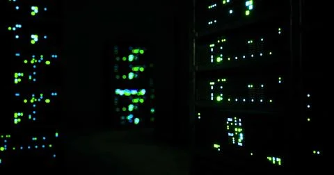 Bright lights illuminate data servers in a dark server room environment 스톡 일러스트