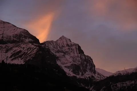 Bright lit cloud over Mount Arprlistock, Switzerland. Stock Photos