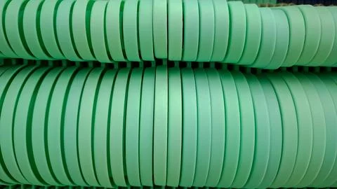 Bright Mint Green Plastic Ring Plates Stack Close Up Pattern Stock Photos