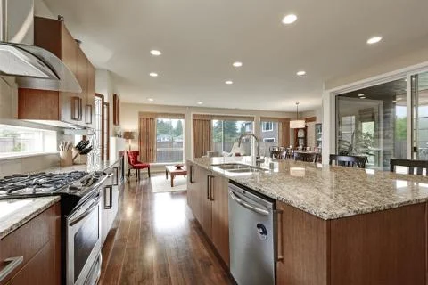 Bright modern open plan kitchen room interior.  Stock Photos