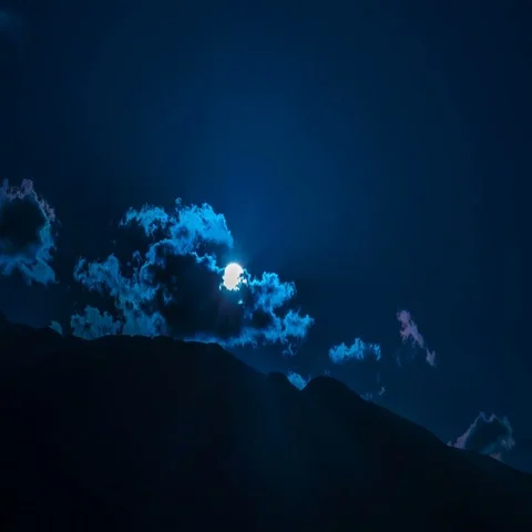 The bright moon on the background of the mountain. Wide angle. Time lapse Stock Footage 69499801
