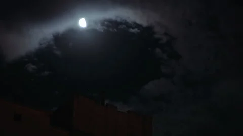 Bright Moon in Cloudy Sky Over House Roof Timelapse Video Stock Footage 139443487