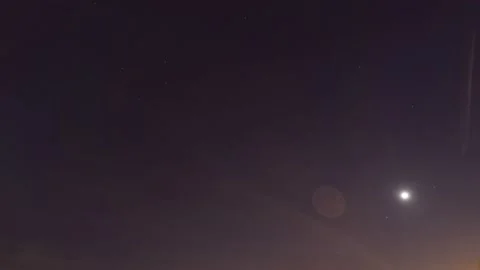 Bright moon light ray n lens flare effect in starry star night sky Stock Footage 161954524