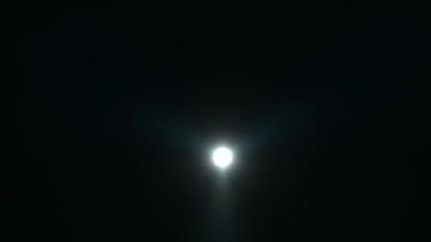 Bright moon shining in a dark night sky with soft clouds Vídeo Stock 339059617